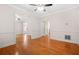 Bright living room featuring hardwood floors and view to foyer at 557 Lawton Sw St, Atlanta, GA 30310