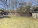 Large backyard offering plenty of space for outdoor activities and gardening at 690 Winding River Dr, Lawrenceville, GA 30046