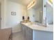 Bathroom with a large mirror, vanity, tile floor and generous countertop space at 690 Winding River Dr, Lawrenceville, GA 30046
