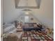 Spacious bonus room with pitched ceilings, cozy seating, and ample storage at 690 Winding River Dr, Lawrenceville, GA 30046