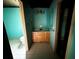 This bathroom has tile floors, a wooden vanity, and modern fixtures at 105 Doe Dr, Temple, GA 30179