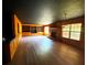 Bright living room with built-in shelving, stone fireplace and hardwood floors at 105 Doe Dr, Temple, GA 30179