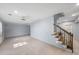 Spacious finished basement with neutral walls and lighting, perfect for flexible use at 1880 Redbourne Dr, Atlanta, GA 30350