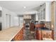 Spacious kitchen with stone countertops, stainless steel appliances, and custom cabinetry at 1880 Redbourne Dr, Atlanta, GA 30350