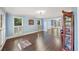 Bright and airy living room with hardwood floors, large windows, and elegant trim at 1880 Redbourne Dr, Atlanta, GA 30350