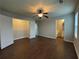 Spacious bedroom with wooden floors and ensuite bathroom and closet access at 241 Coral Cir, Mcdonough, GA 30253