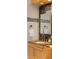 Close up on granite countertop vanity in bathroom with a mirrored medicine cabinet and tile accents at 28 Peachtree Hills Ne Ave, Atlanta, GA 30305