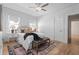 Bright bedroom with hardwood floors, neutral decor, and lots of natural light at 28 Peachtree Hills Ne Ave, Atlanta, GA 30305