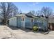 Charming blue home with a covered porch and well-maintained landscaping at 28 Peachtree Hills Ne Ave, Atlanta, GA 30305