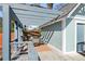 Patio with a covered outdoor dining area and shade at 28 Peachtree Hills Ne Ave, Atlanta, GA 30305