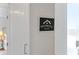 Peachtree Hills community sign with establishment year on wall next to white barn door in bedroom at 28 Peachtree Hills Ne Ave, Atlanta, GA 30305