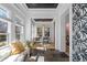 Bright sunroom with slate flooring, black ceiling, and lots of natural light at 28 Peachtree Hills Ne Ave, Atlanta, GA 30305