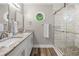 Beautiful bathroom with double vanity, walk-in shower, and modern finishes at 4934 Woodstream Nw Ln, Acworth, GA 30102