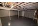 Unfinished basement with painted floors and exposed ceiling, offering potential for customization and expansion at 600 Mary Erna Dr, Fairburn, GA 30213