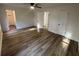 A view of the bedroom featuring light colored flooring, a ceiling fan, and multiple closets at 600 Mary Erna Dr, Fairburn, GA 30213