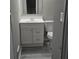 Bathroom with a vanity with storage and a toilet with gray floors at 6354 Shannon Pkwy # 20D, Union City, GA 30291