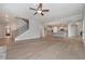 Hardwood floors flow from the living room to the kitchen and staircase at 6861 Ga Hwy 5, Douglasville, GA 30135