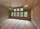 Spacious living room with tall windows and natural light at 6861 Ga Hwy 5, Douglasville, GA 30135