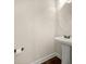 Powder room with pedestal sink and unique hardware at 3257 Alhambra Cir, Hampton, GA 30228