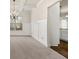 A carpeted dinning room with a coffered ceiling and wainscotting at 3257 Alhambra Cir, Hampton, GA 30228
