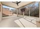 Inviting screened porch with ceiling fan and open views of the backyard at 3257 Alhambra Cir, Hampton, GA 30228