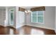 Dining room with hardwood floors, large windows, and modern chandelier at 3538 Serenade Nw Commons, Kennesaw, GA 30152