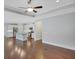 Spacious open living area featuring modern kitchen, hardwood floors, and ample natural light at 3538 Serenade Nw Commons, Kennesaw, GA 30152