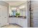Beautiful bathroom featuring dual sinks, granite countertops, and a tiled shower at 401 Night Hawk Ct, Canton, GA 30114