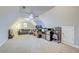 Large bonus room provides a comfortable seating area, desk space, and ample room for storage at 401 Night Hawk Ct, Canton, GA 30114