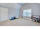 Spacious bonus room with exercise equipment and room to move around at 401 Night Hawk Ct, Canton, GA 30114