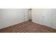 Bedroom featuring neutral carpet, white walls, and two entryways at 4940 Elm Brook Dr, Atlanta, GA 30349