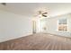 Bright bedroom with a ceiling fan and natural light streaming through the window at 4940 Elm Brook Dr, Atlanta, GA 30349