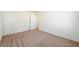 This bedroom has neutral walls, carpet, and a double door closet at 4940 Elm Brook Dr, Atlanta, GA 30349