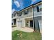 Exterior view of a home showcasing its garage, neat landscaping, and welcoming entrance with a wreath at 4940 Elm Brook Dr, Atlanta, GA 30349