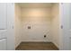 Functional laundry room with laminate flooring and washer-dryer hookups at 4940 Elm Brook Dr, Atlanta, GA 30349