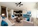 Open-plan living area with hardwood floors, modern furniture, and a view into the kitchen at 4940 Elm Brook Dr, Atlanta, GA 30349