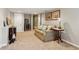Finished basement featuring a sofa, guitar, bar, and framed art at 1155 Moores Mill Nw Rd, Atlanta, GA 30327