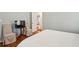 Bright bedroom featuring hardwood floors, a television, and access to an adjoining room at 1155 Moores Mill Nw Rd, Atlanta, GA 30327