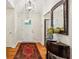 Inviting foyer featuring hardwood floors and a decorative mirror at 1155 Moores Mill Nw Rd, Atlanta, GA 30327