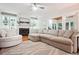 Cozy living room featuring a fireplace with built-in bookshelves and plush seating at 1187 Druid Walk, Decatur, GA 30033