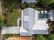 Aerial view of home with pool, patio with umbrellas, landscaped yard, and driveway at 230 Pebble Trl, Alpharetta, GA 30009
