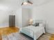 Bedroom featuring hardwood floors, a comfortable bed, and natural lighting at 230 Pebble Trl, Alpharetta, GA 30009