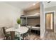 Charming sleeping nook with cozy bunk beds, a dining table, and soothing neutral decor at 230 Pebble Trl, Alpharetta, GA 30009