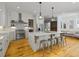 Beautiful kitchen features a large island, stainless steel appliances, and lots of storage at 230 Pebble Trl, Alpharetta, GA 30009
