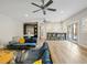Spacious living room with a comfortable sofa, bar seating, and open layout at 230 Pebble Trl, Alpharetta, GA 30009