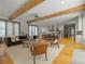 Open-concept living room with a view into the modern, bright kitchen at 230 Pebble Trl, Alpharetta, GA 30009
