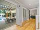 Bright and airy living room with doors leading to an outdoor dining area at 230 Pebble Trl, Alpharetta, GA 30009