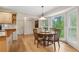 Kitchen and breakfast nook with bright lighting at 5155 Pine Branch Pt, Atlanta, GA 30338