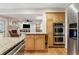 Well-equipped kitchen with granite countertops and stainless steel appliances at 5155 Pine Branch Pt, Atlanta, GA 30338