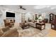 Formal living room with hardwood floors and fireplace at 5155 Pine Branch Pt, Atlanta, GA 30338